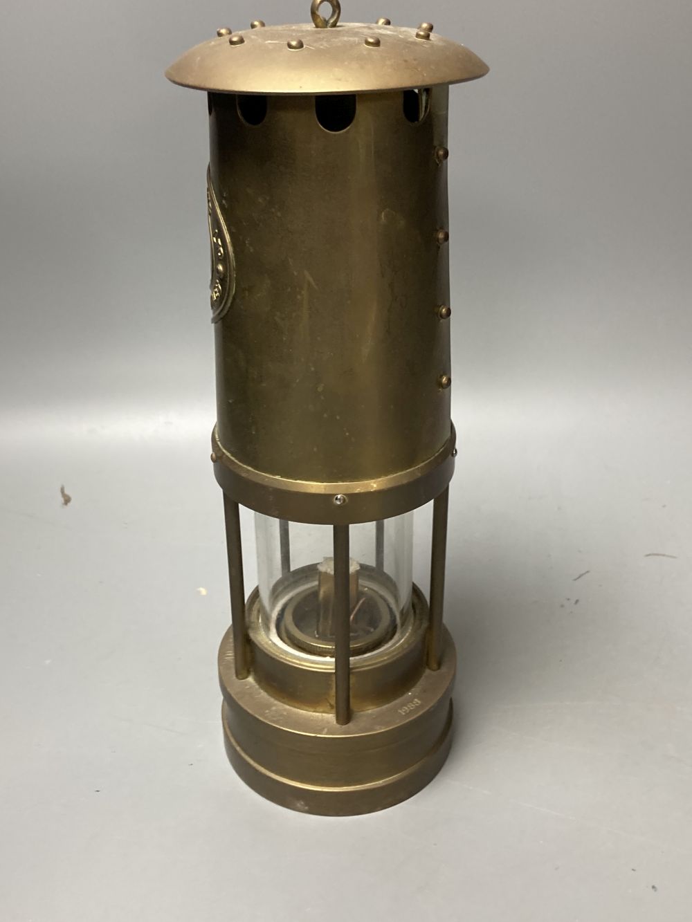 Three brass and chrome miners lamps, 25cm high
